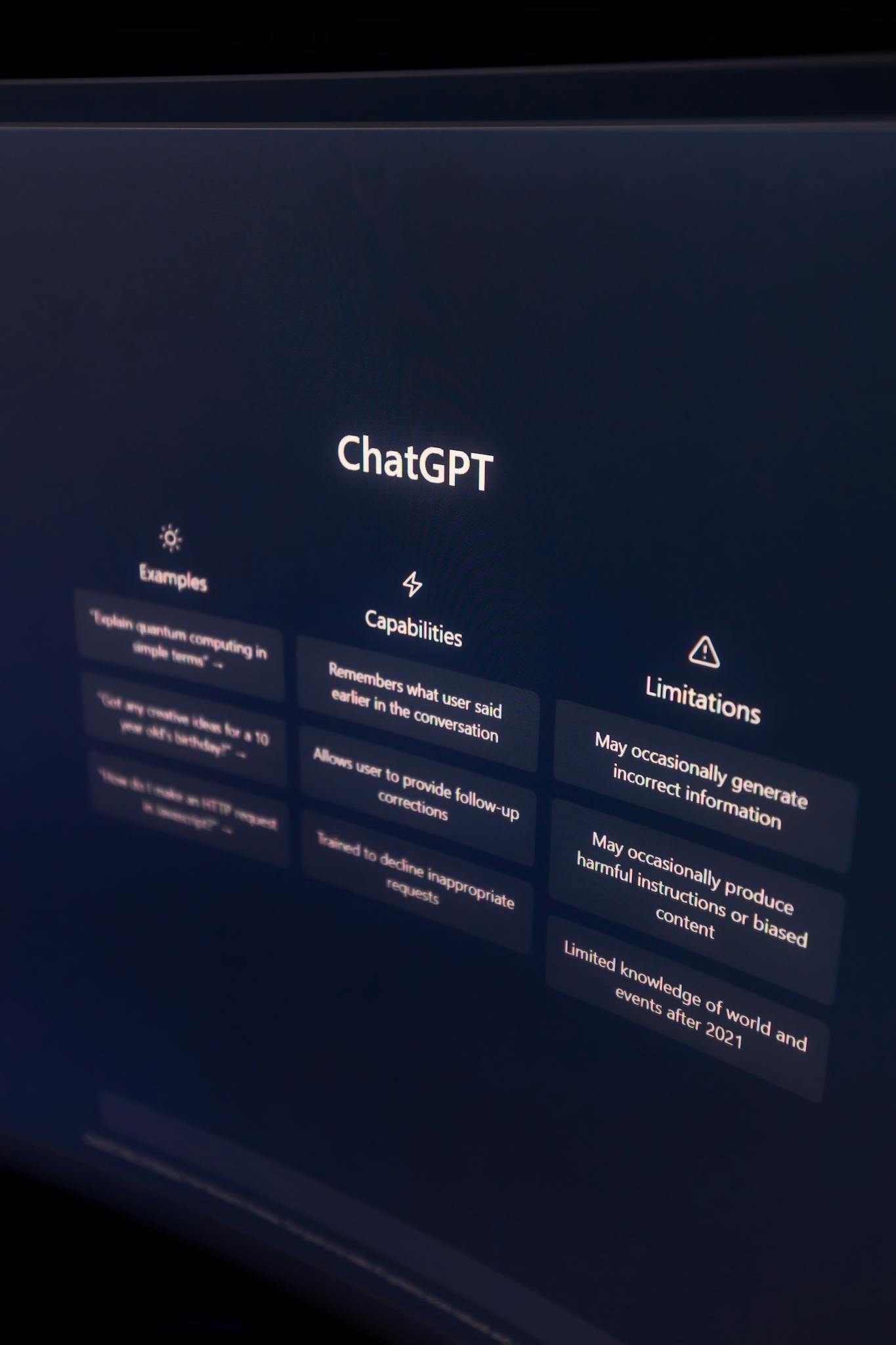 High-resolution image of ChatGPT interface displayed on a monitor, highlighting its capabilities and limitations.